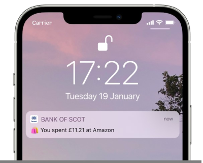 Mobile phone showing a notification from Bank of Scotland on the lock screen.