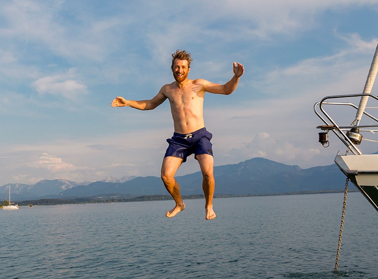 Man jumping into the sea