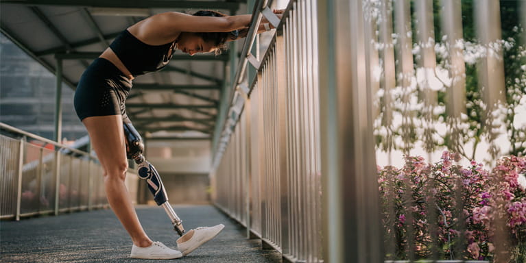 Woman stretching her legs after a workout