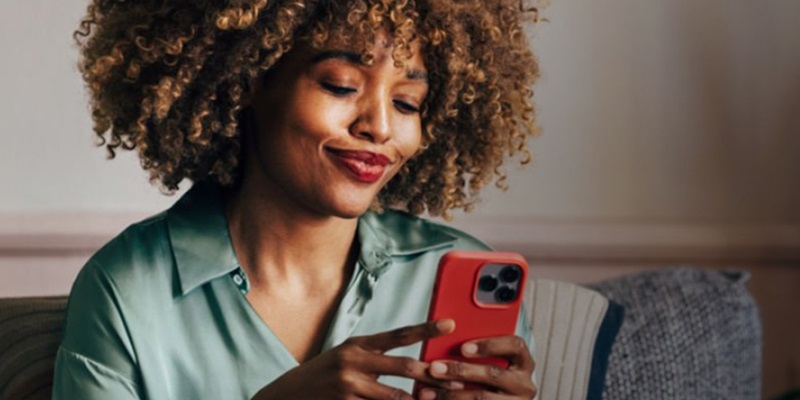 Lady looking at her options on her phone.