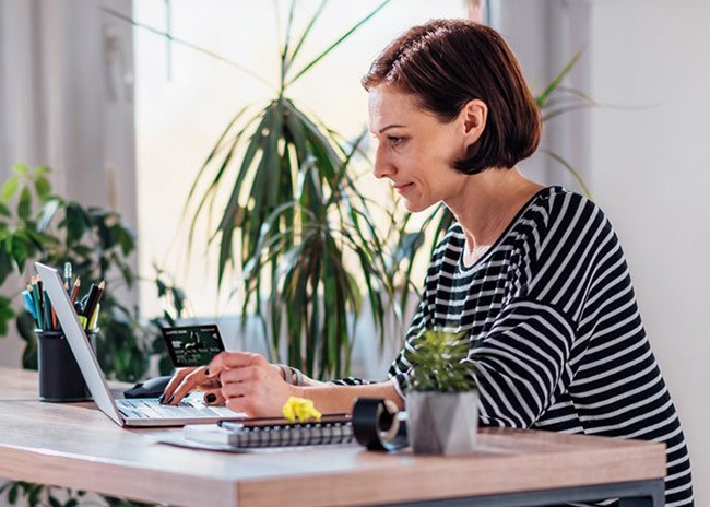 Image of a woman using a laptop 