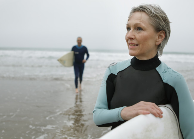 Couple surfboarding.