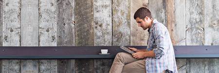 Image of a man on a tablet