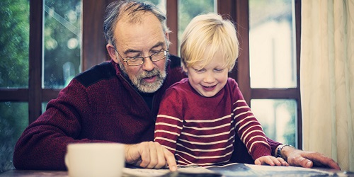 An image of grandfather and grandchild.